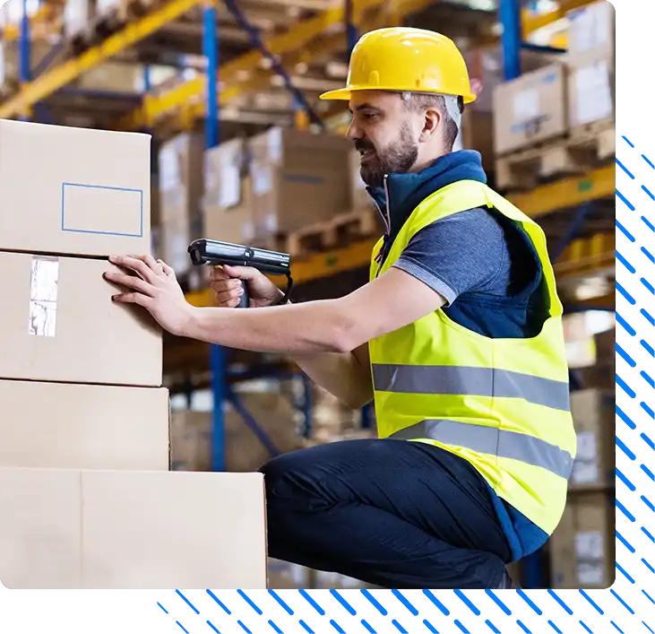 Male warehouse worker with barcode scanner