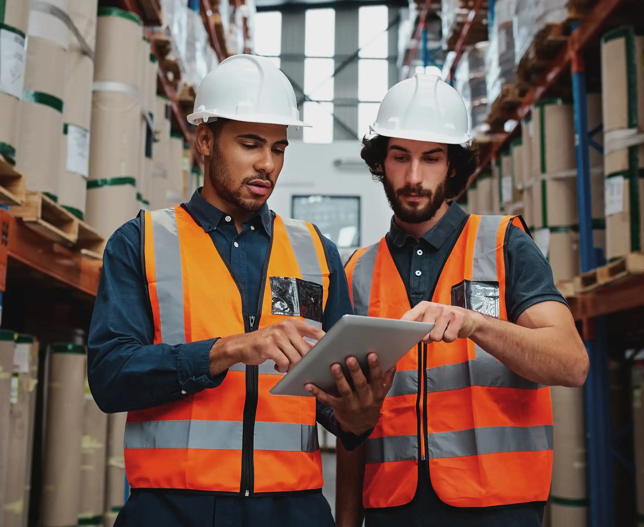 warehouse discussing inventory stock