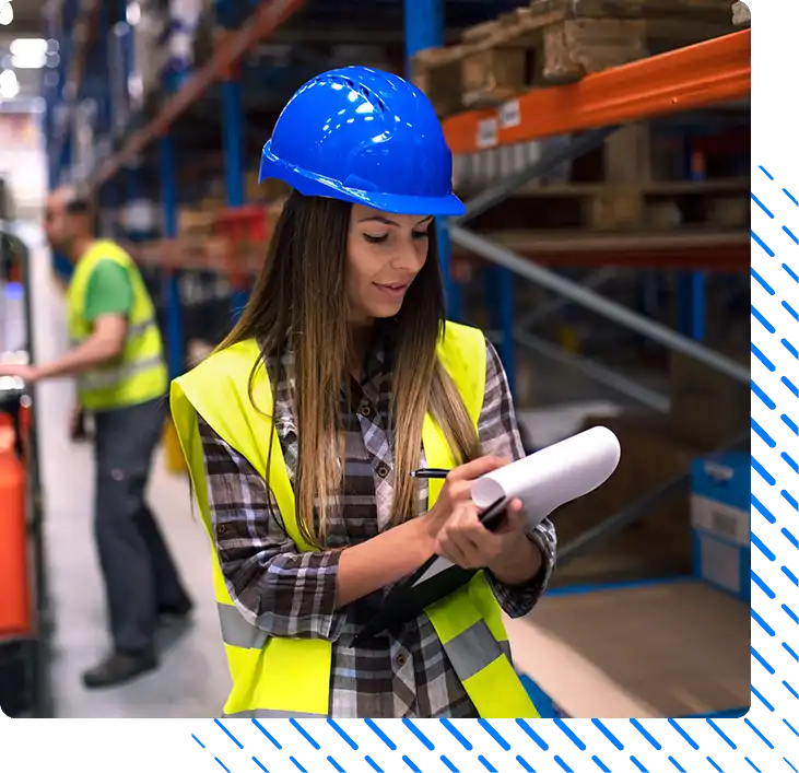 warehouse worker checking inventory in storage department