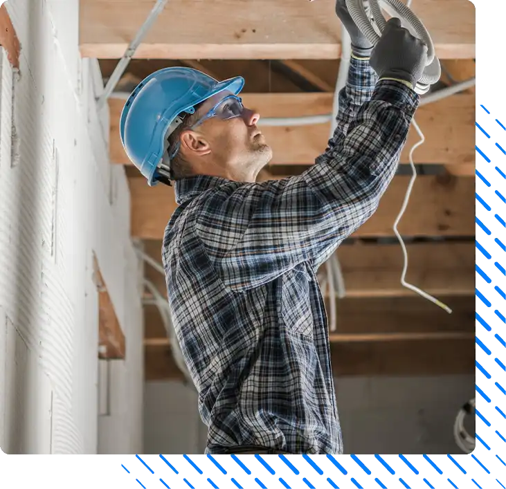 Professional Electrician Installing Ceiling Light Point