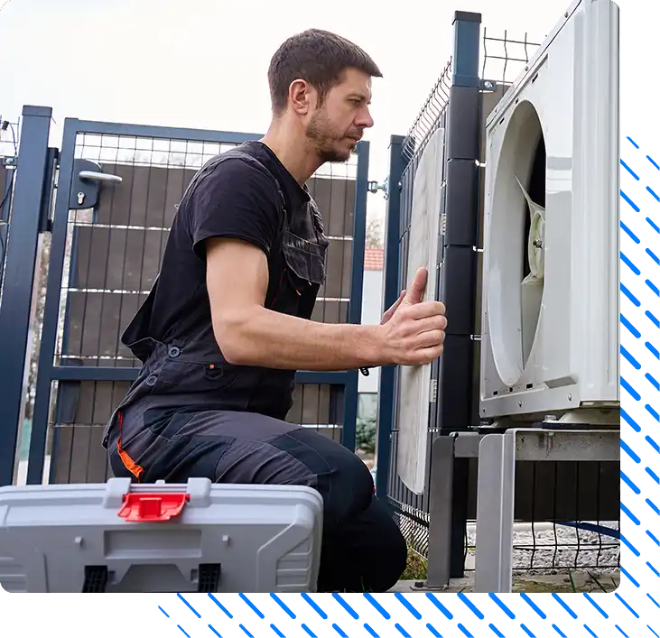 Technician performing maintenance HVAC