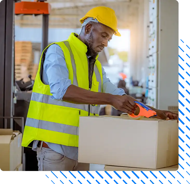 Industry worker used tape to packing produce boxes Industry worker used tape to packing produce boxes