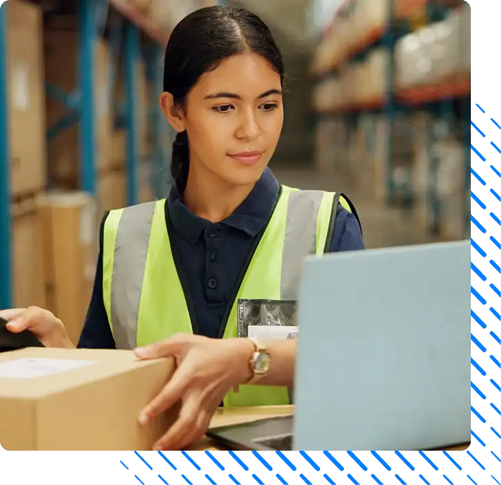 woman scanning box in warehouse